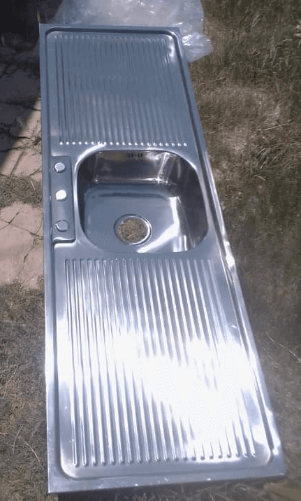 Fregadero inoxidable de 1 seno  y   1 escurridor a ambos lados